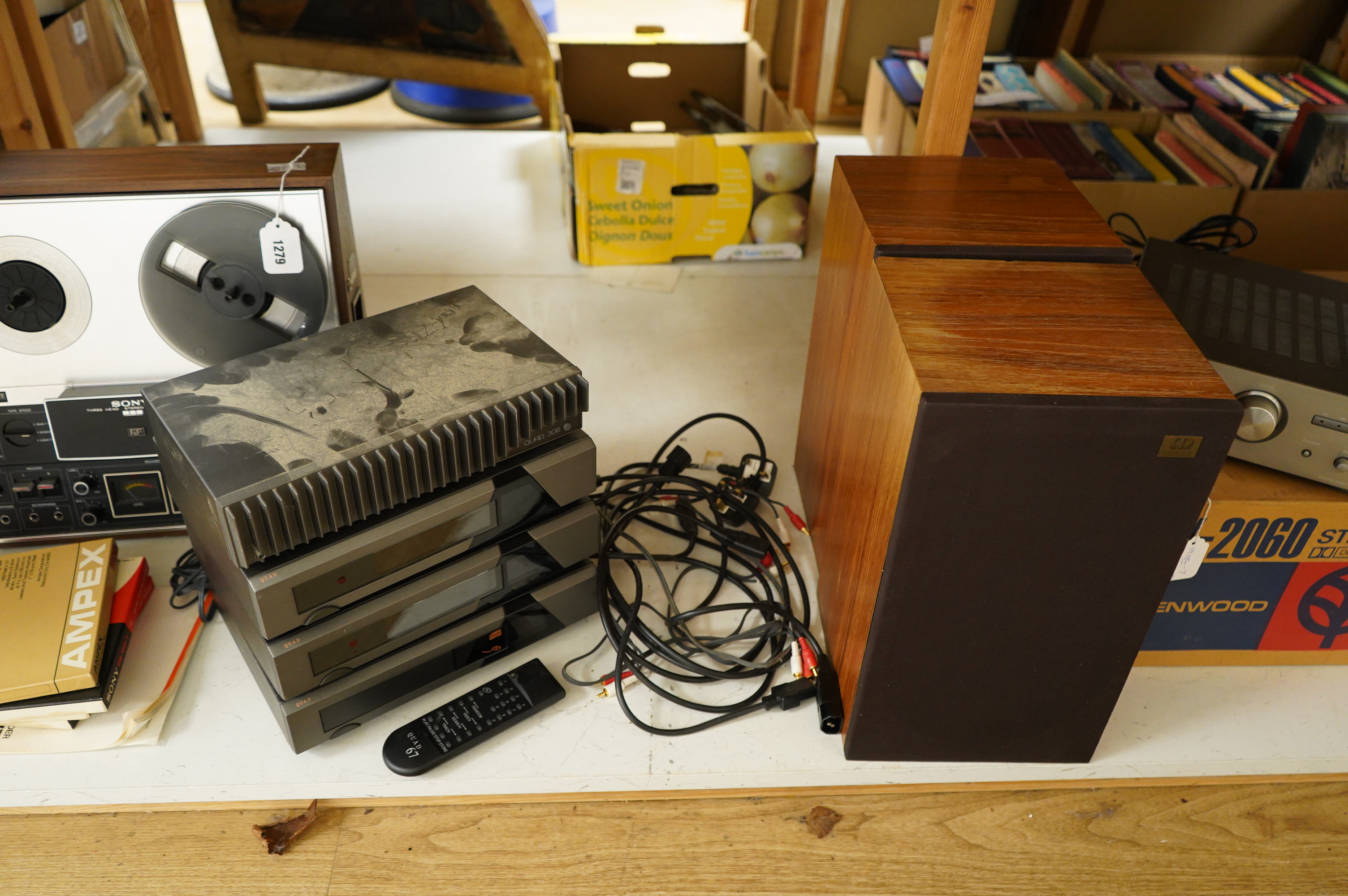 Four Quad Electroacoustics Ltd. stereo separates; a Quad 306 Power Amplifier, serial no. Q024306, a Quad 66 Preamplifier, a Quad 67 CD Player with remote control and a Quad 66 FM Tuner